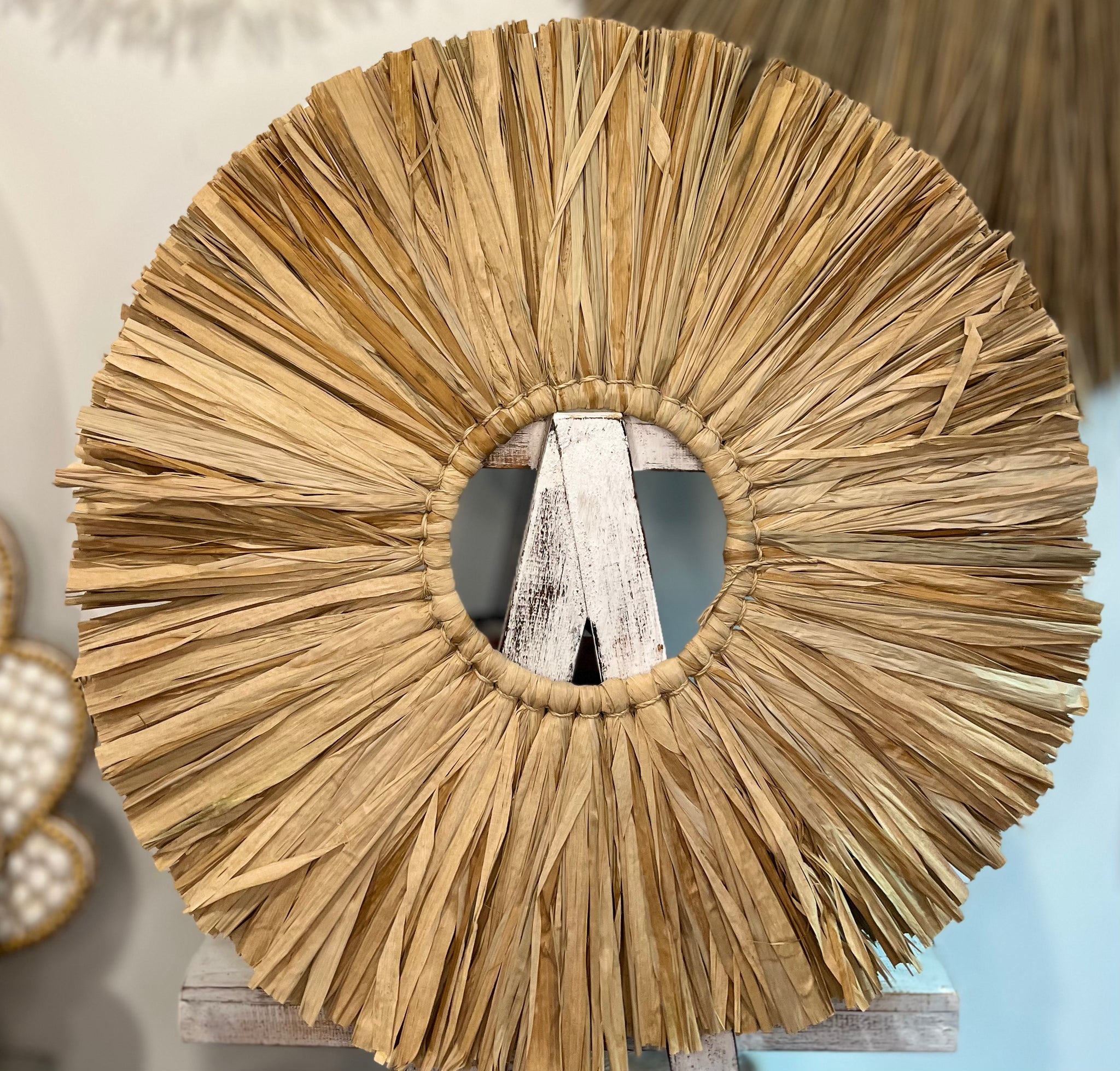 Round raffia wall hanging