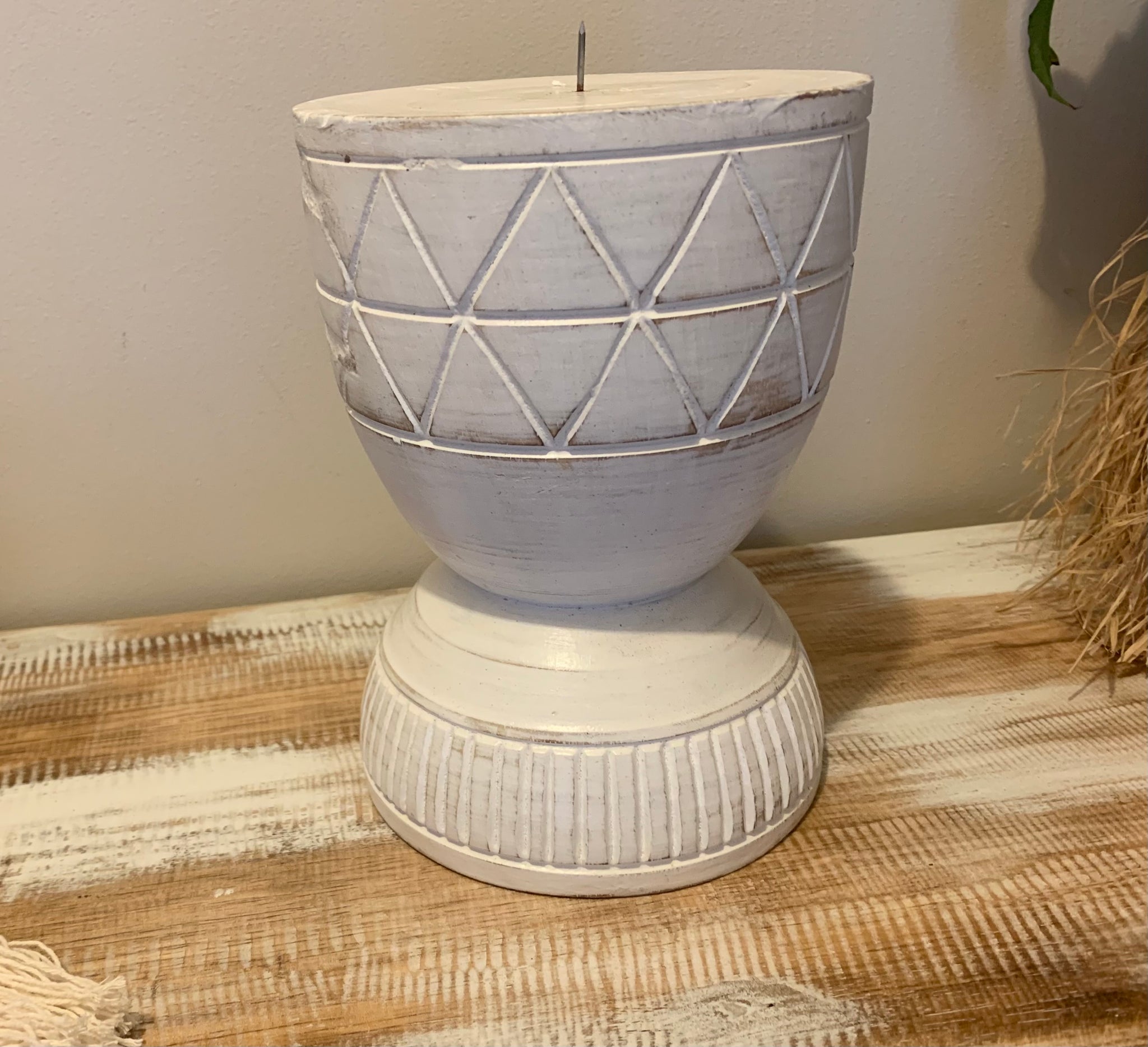 Large white candle holder.