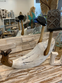 White timber duck wine holder.