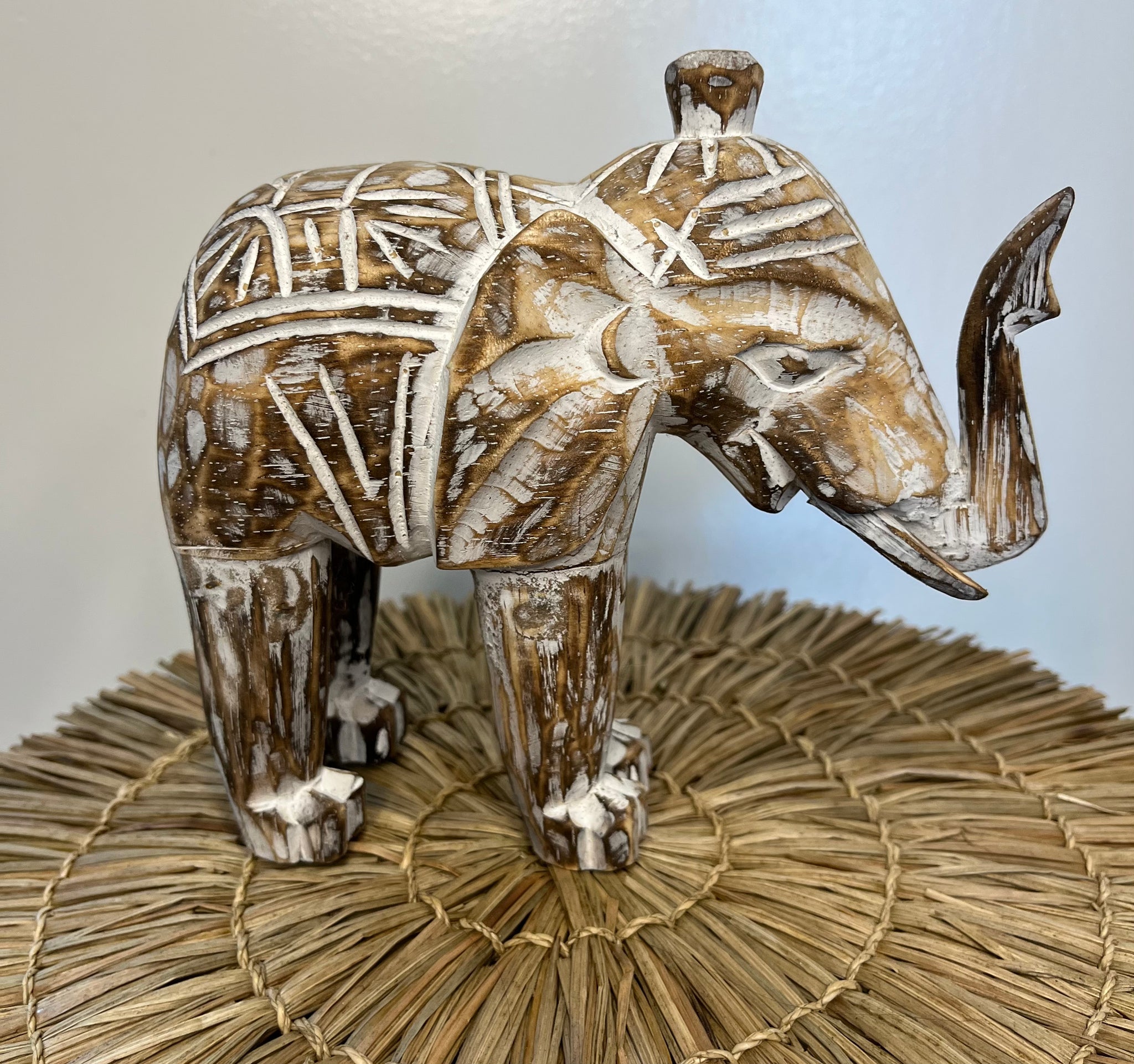 Timber handcarved elephants brown . Small