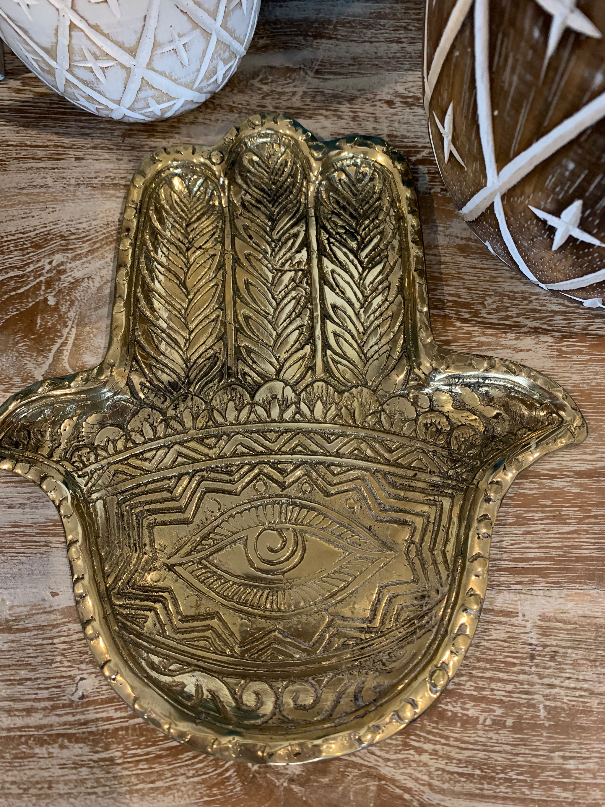 Brass hamsa hand tray.