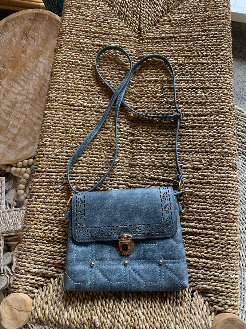 Blue handbag.