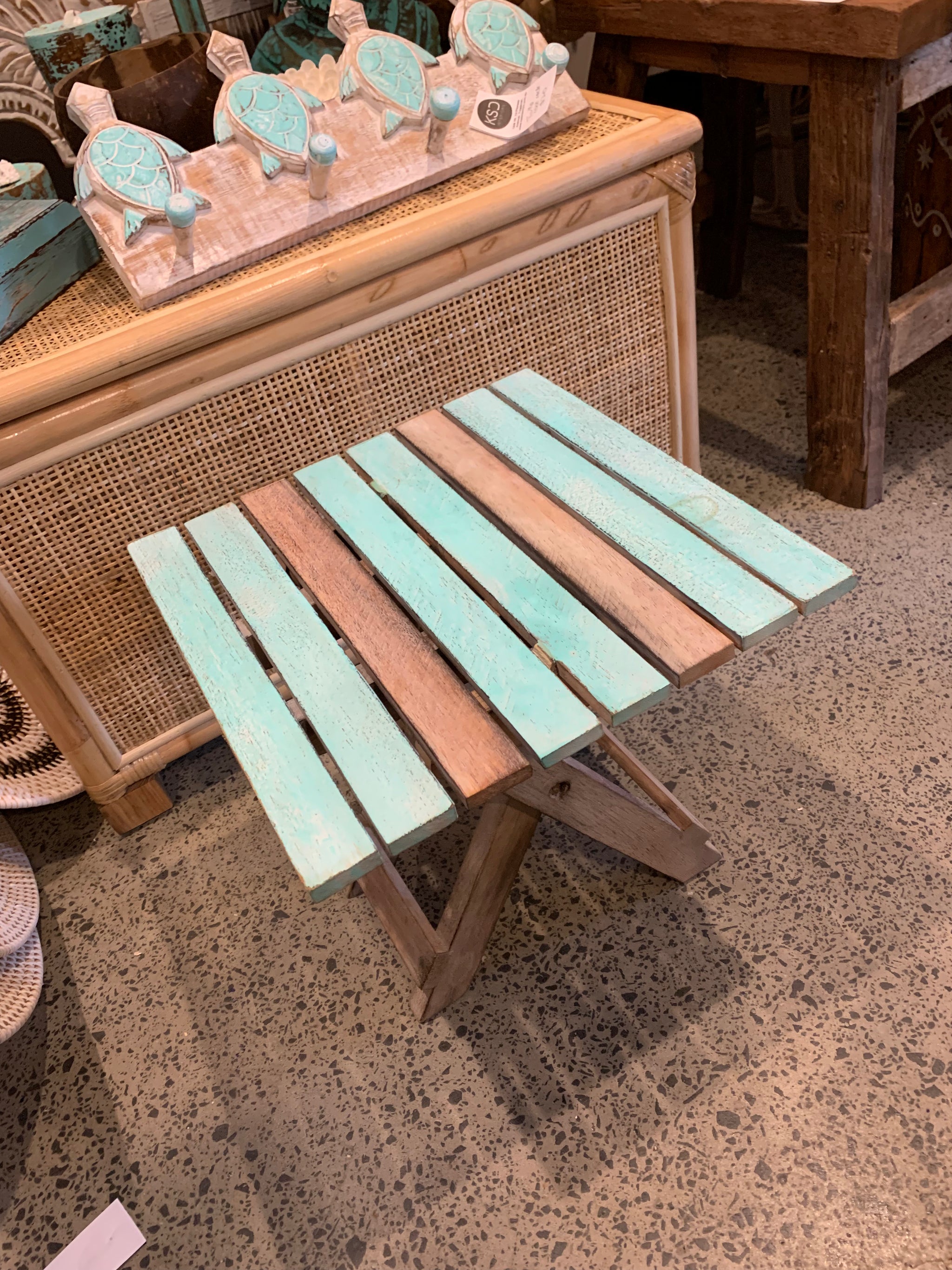 Folding timber square design table. Turquoise / brown