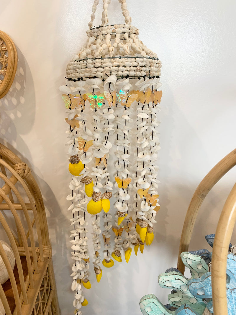 Yellow butterfly and shell mobile hanging