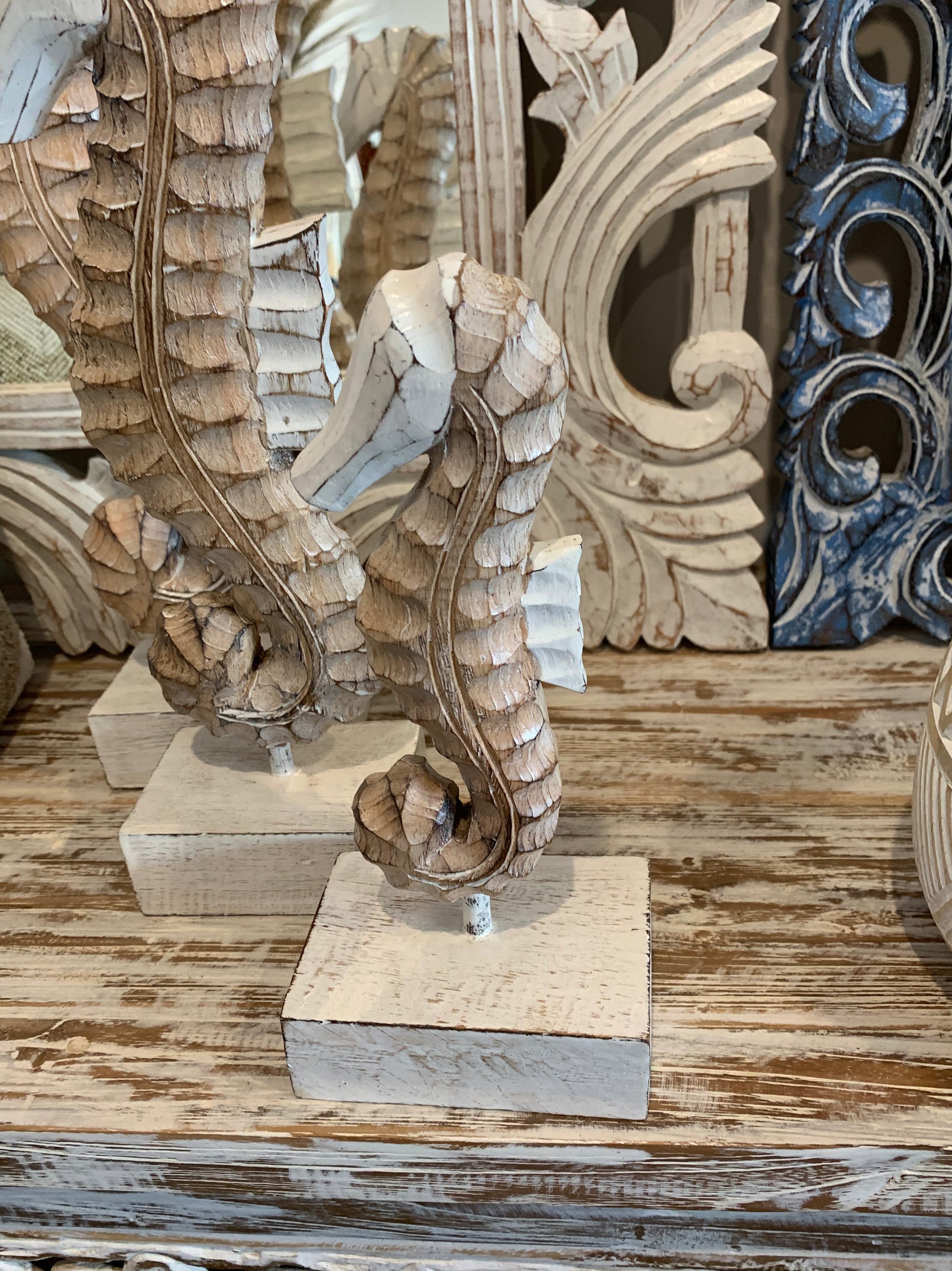 Handcrafted set of 3 timber seahorse. Natural with white heads