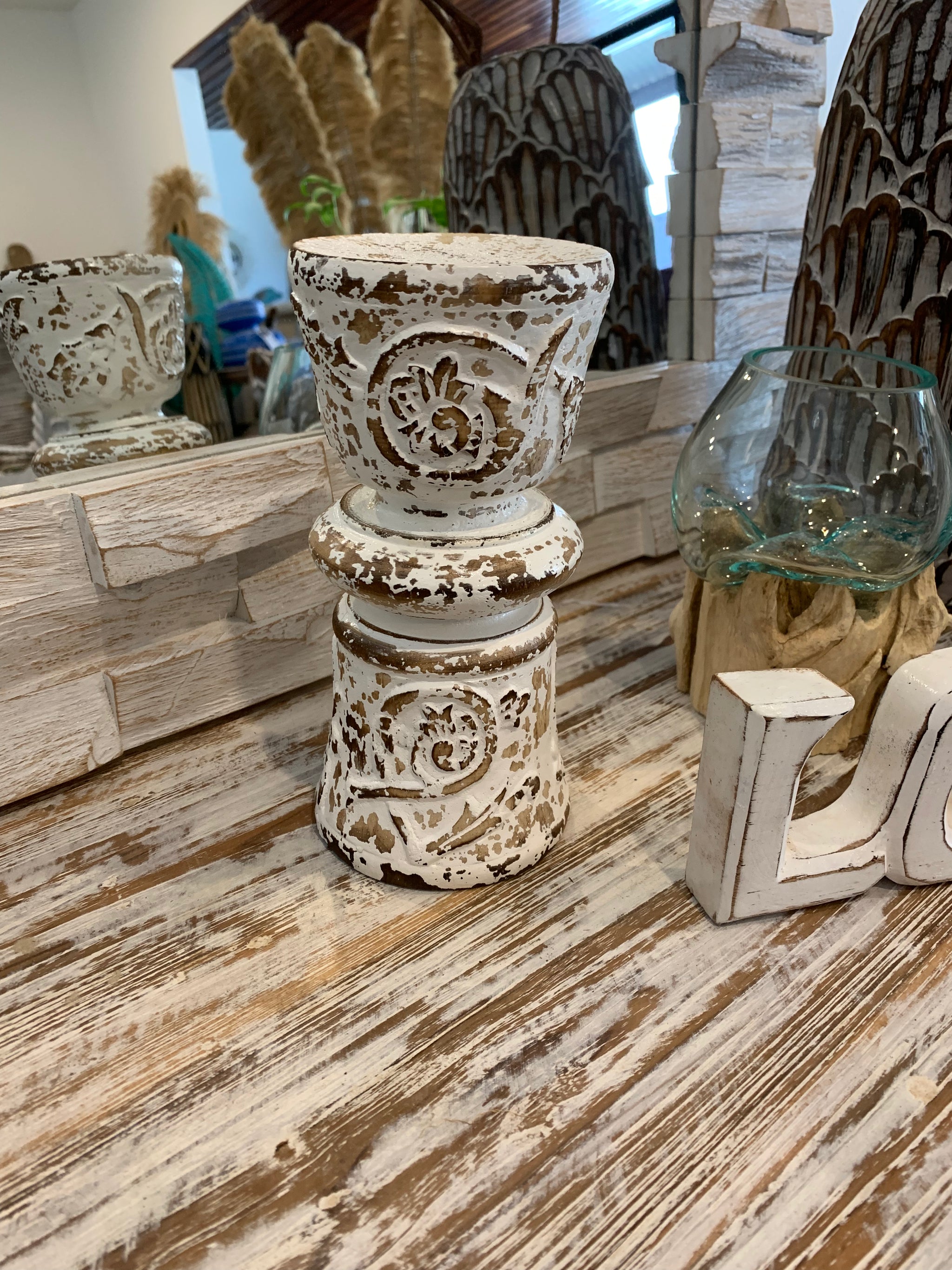 Rustic white candle holder.