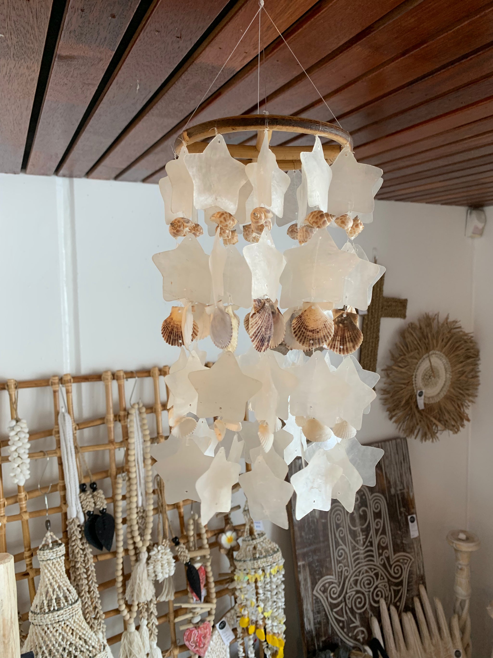 Clear and natural shell mobile hanging. Stars