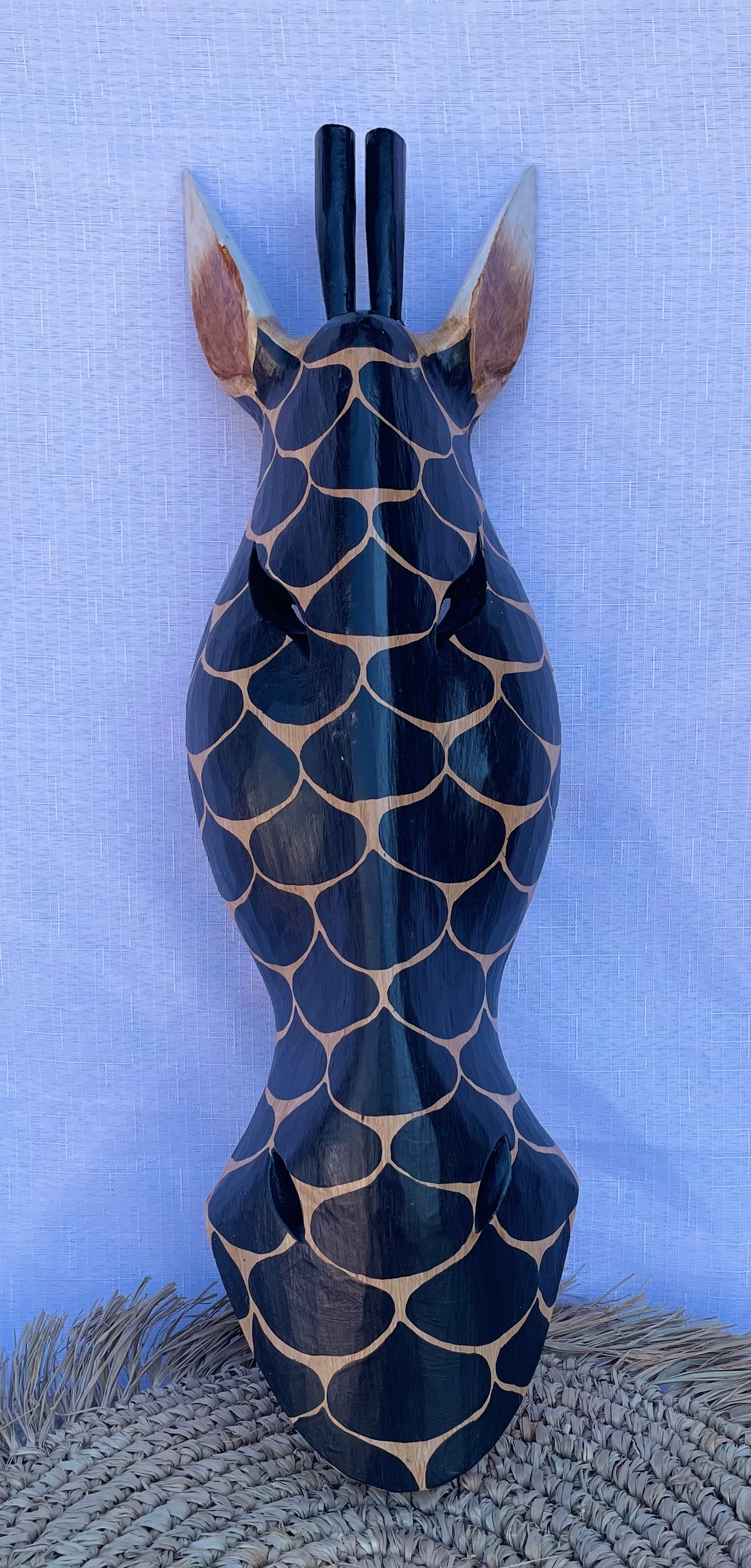 Black handpainted timber giraffe mask. Wall hanging