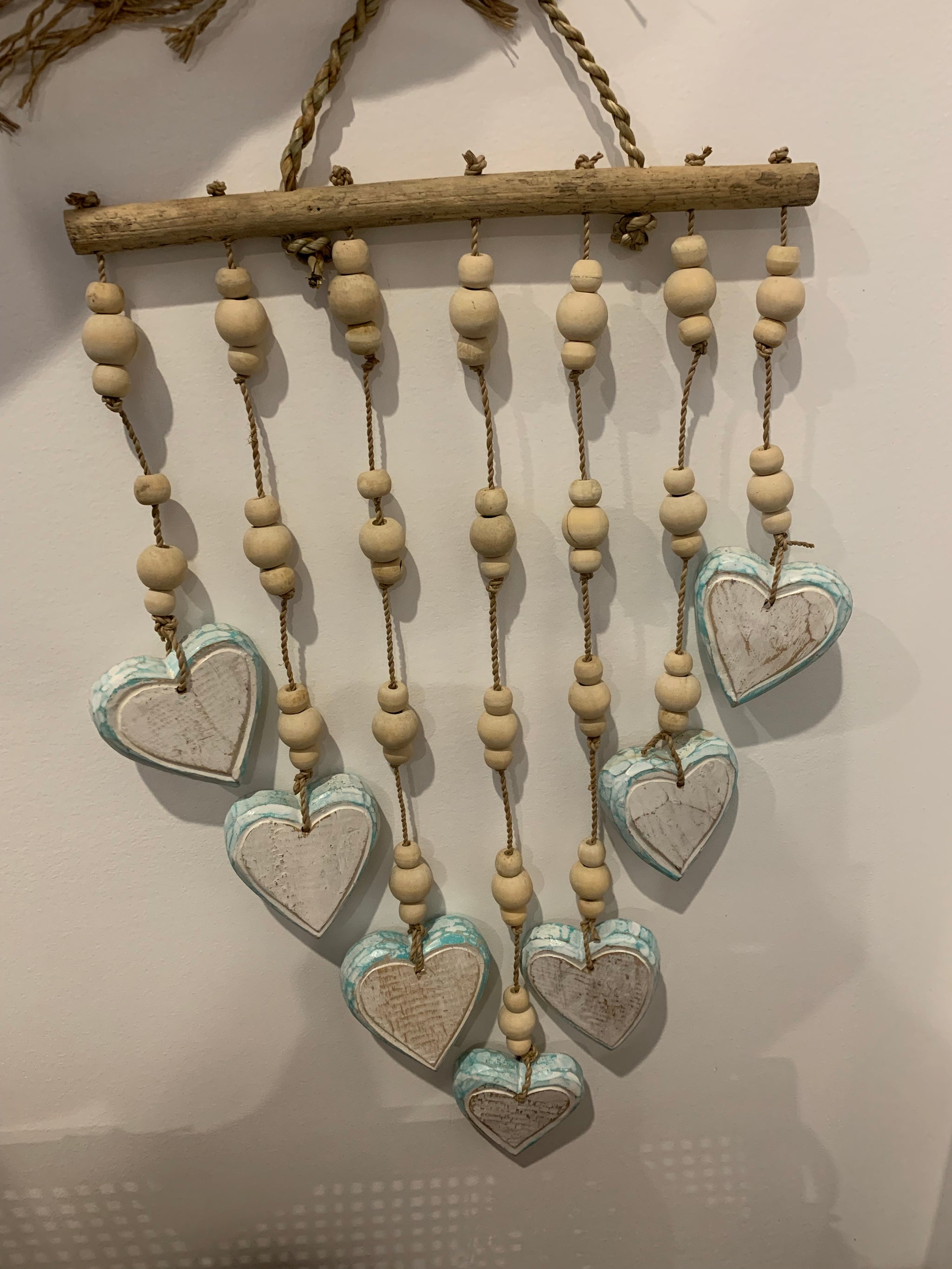 Turquoise blue heart hanging.